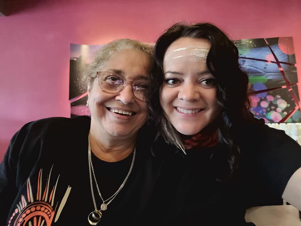 Senior Wurundjeri Elder Aunty Joy Murphy Wandin and Djirri Djirri dancer Stacie Piper smiling together.